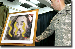 Pictured: U.S. military studies stink lines on a picture of Zarqawi
